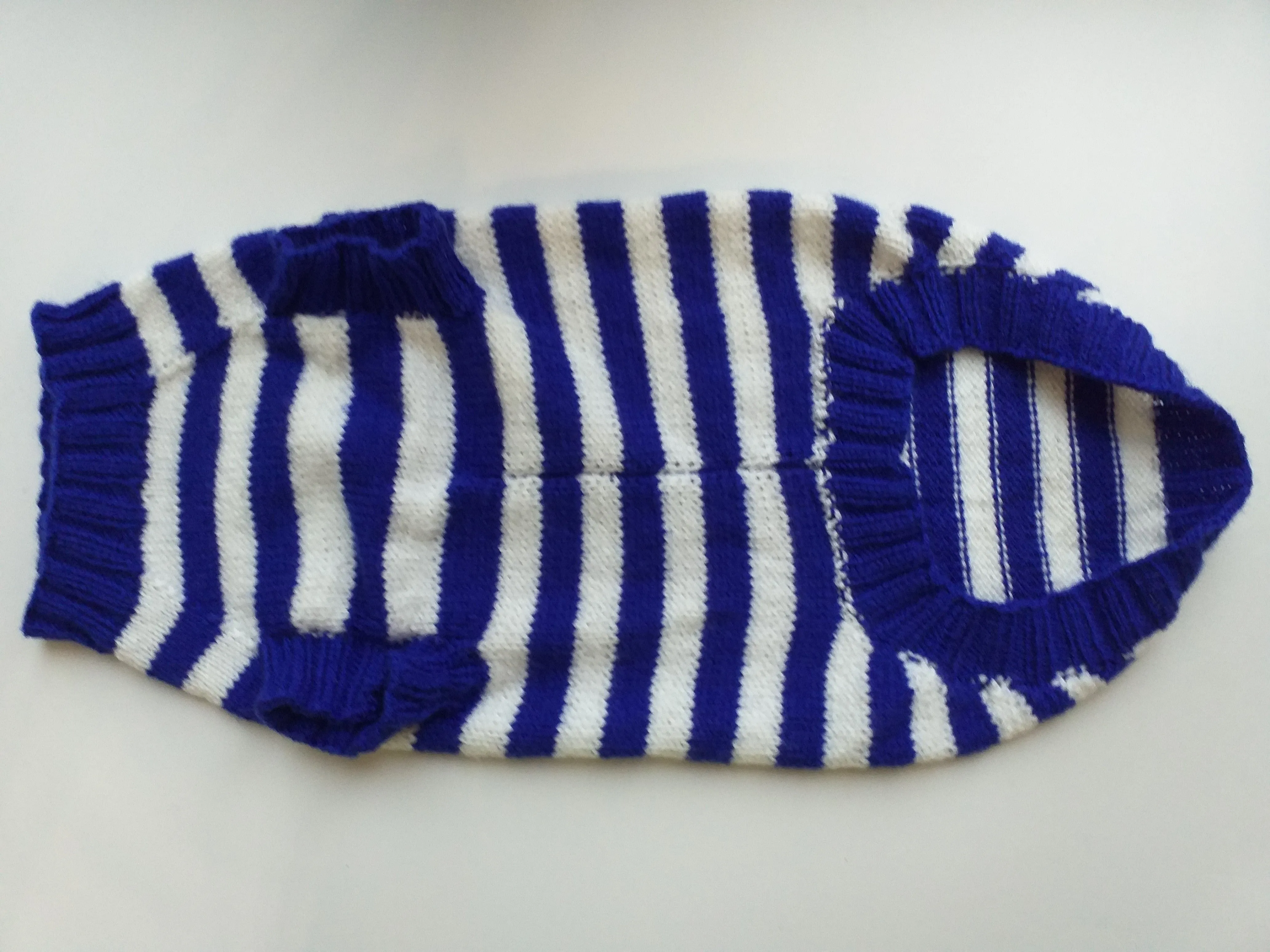 Knitted striped sweater for dog in nautical style